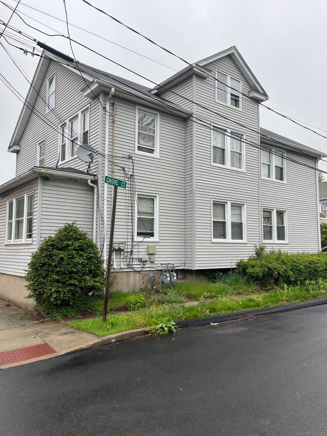 Two family with two car garage and great yard.
