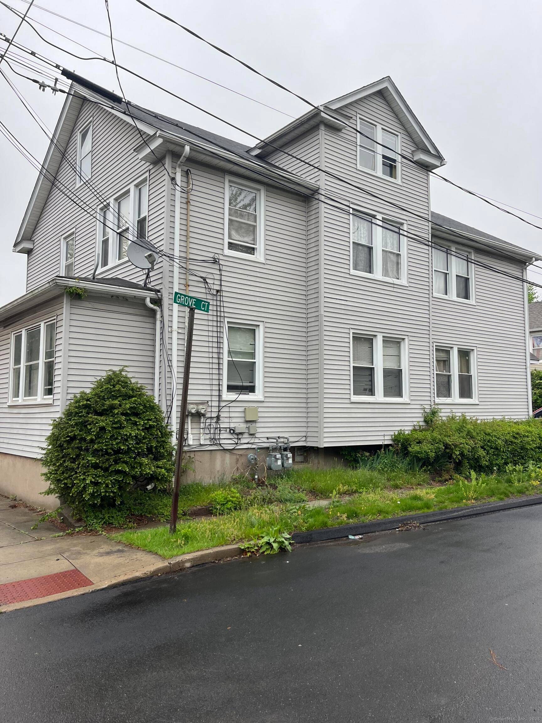 Two family with two car garage and great yard.