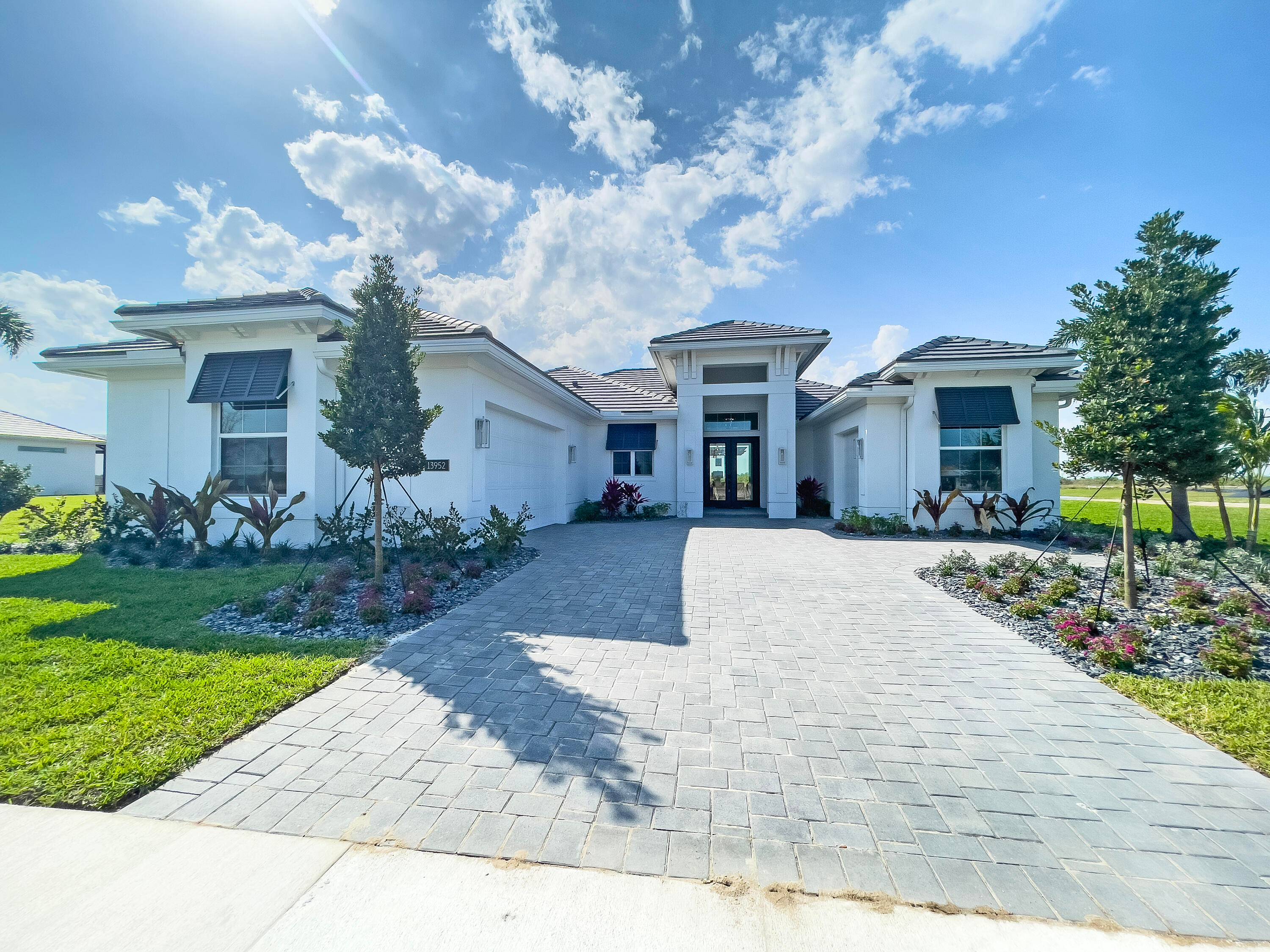 Fullly Decorated Model ! Large Lake View, Large Pool, Sunshelf with Bubbler, 2 raised waterfalls and a SPA !
