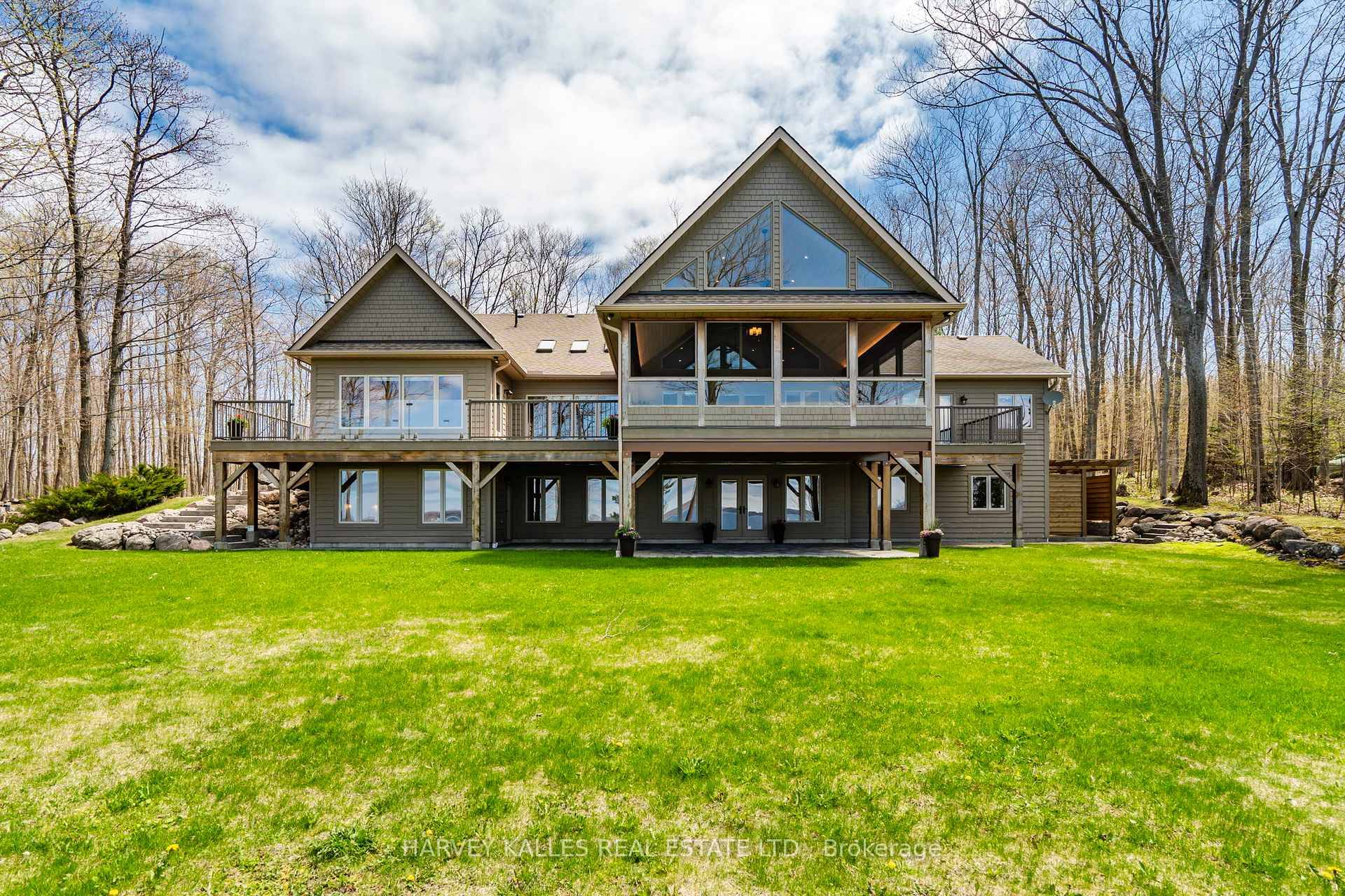 Perched high on a ridge at Cedar Point in the coveted Cedar Ridge community, this home is located just under 2 hours from Toronto.