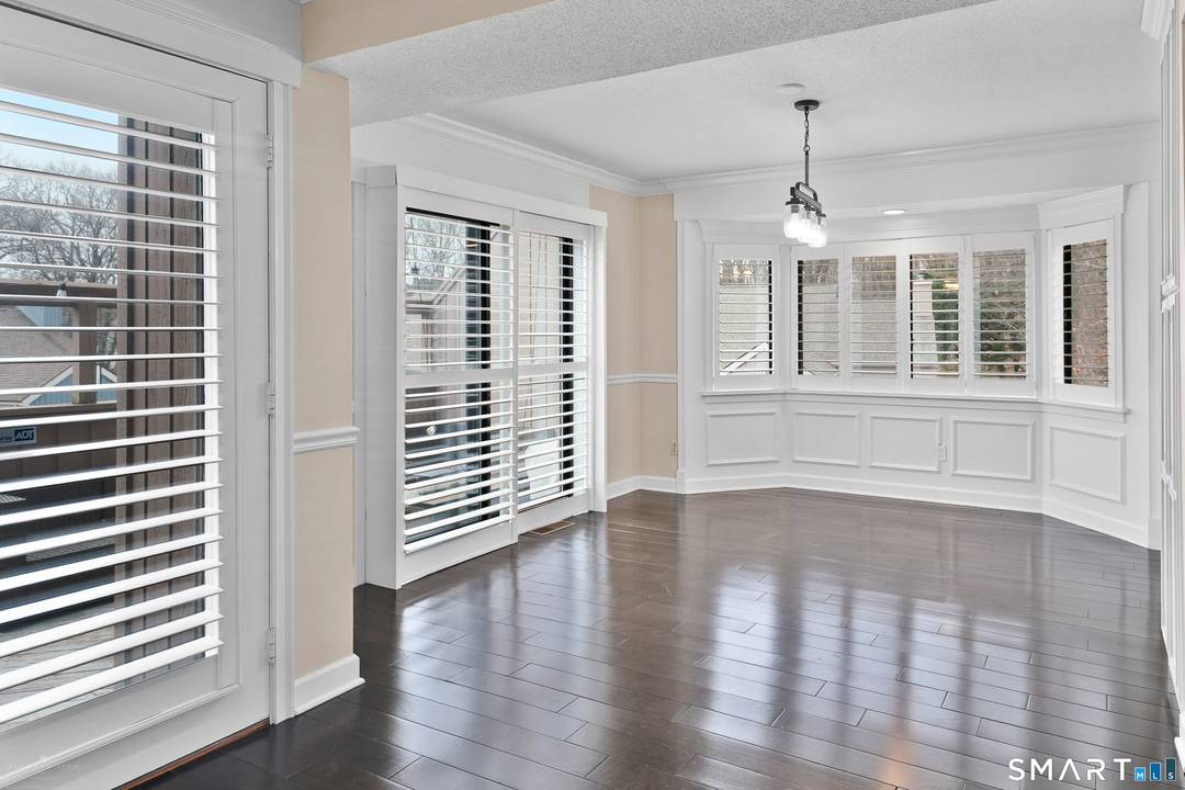 Beautiful end unit condo in the sought after Sunwood community offering exceptional natural light 3 levels of updated living space.