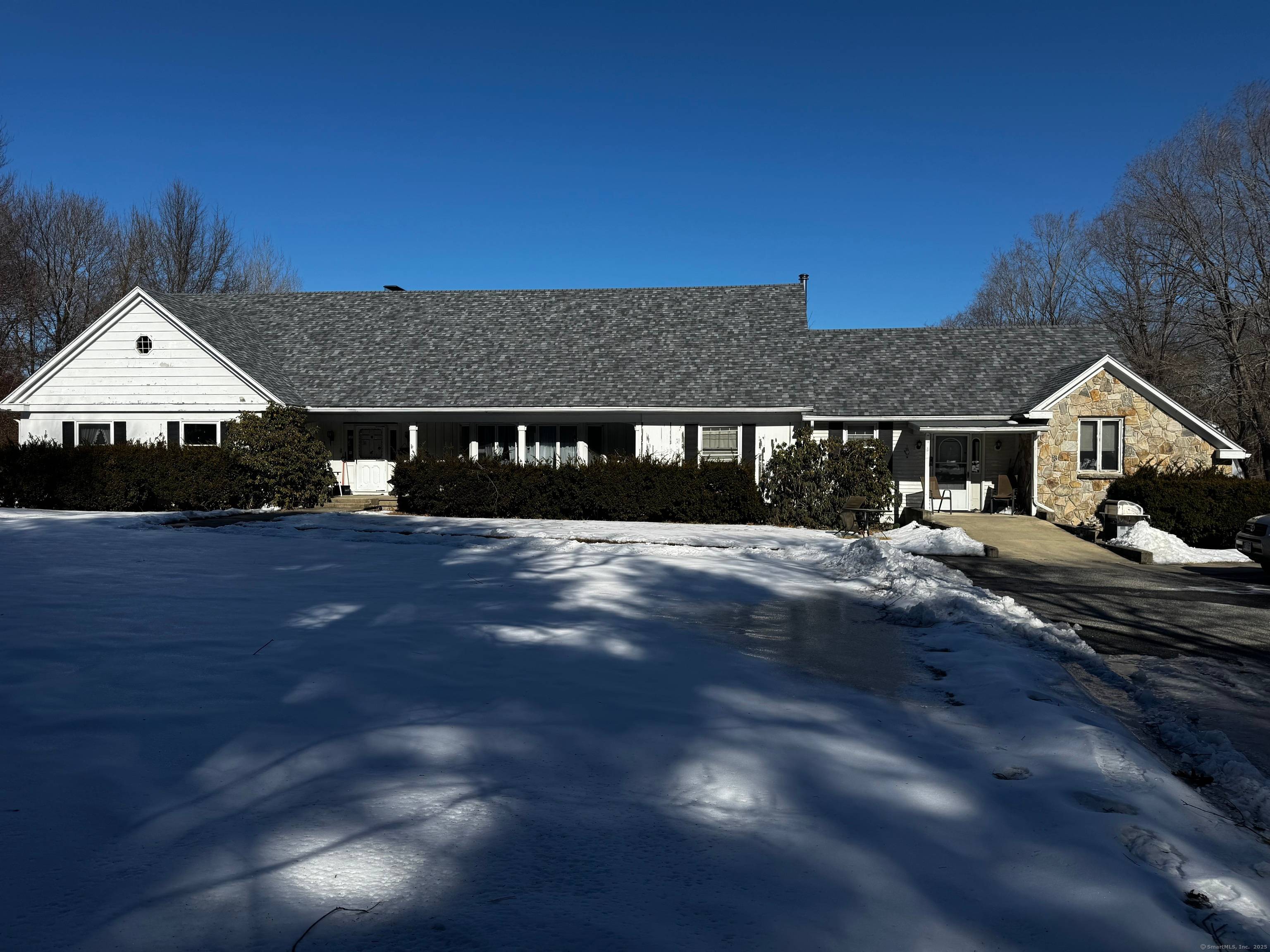 This expansive Cape Cod style home is a hidden gem, situated on 2.