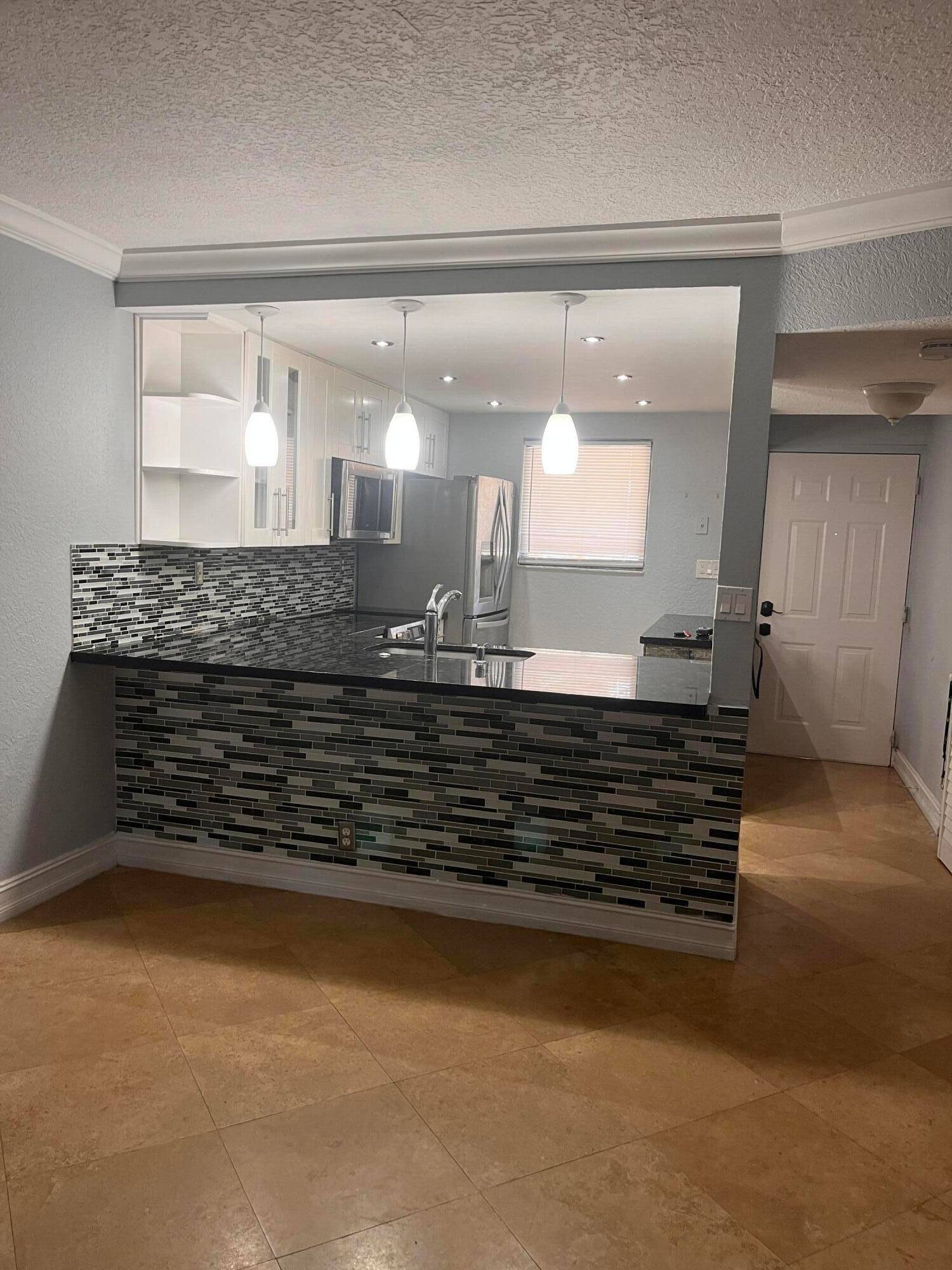 This stunning top floor unit is suitable for all ages and located in a highly rated school district.