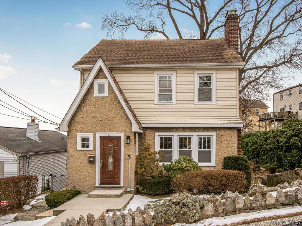 Lovely Home in the Desirable Dunwoodie Seminary Park neighborhood flooded with Natural Light.