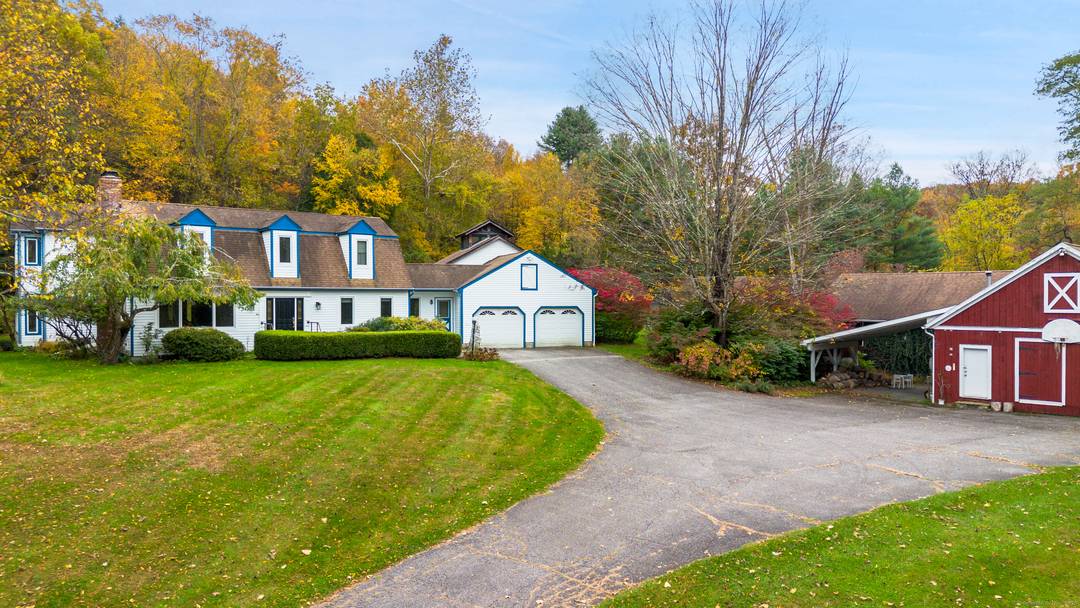 This three bedroom possibly four bedroom, three bathroom home sits on approximately 6.