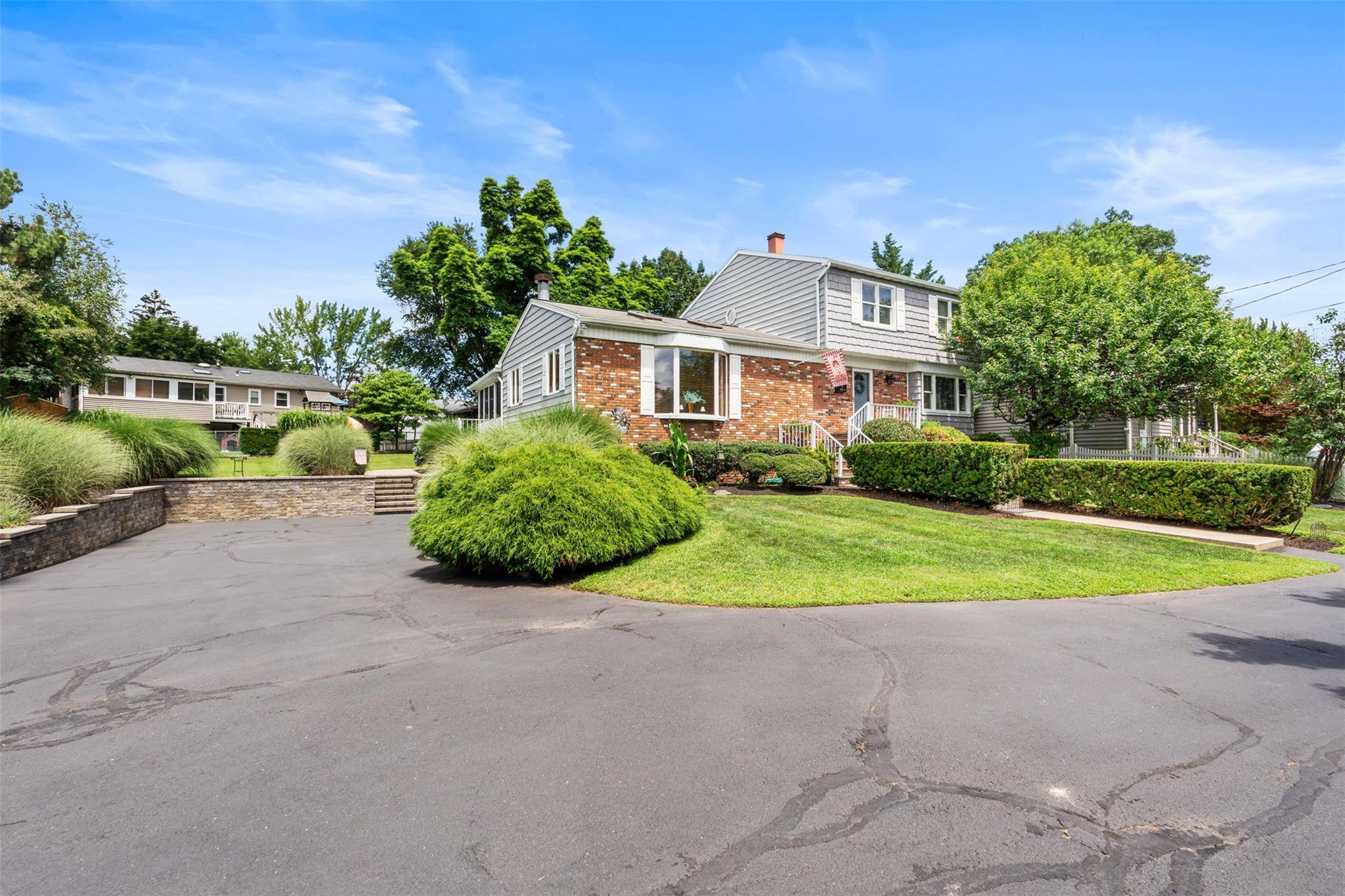 Garnerville, NY LOCATION, LOCATION LOCATION Renovated amp ; Expanded Center Hall Colonial ; 3 4 Bedrooms, 3 Full Baths on Just Under Half an Acre of Gorgeous Professionally Landscaped Level ...