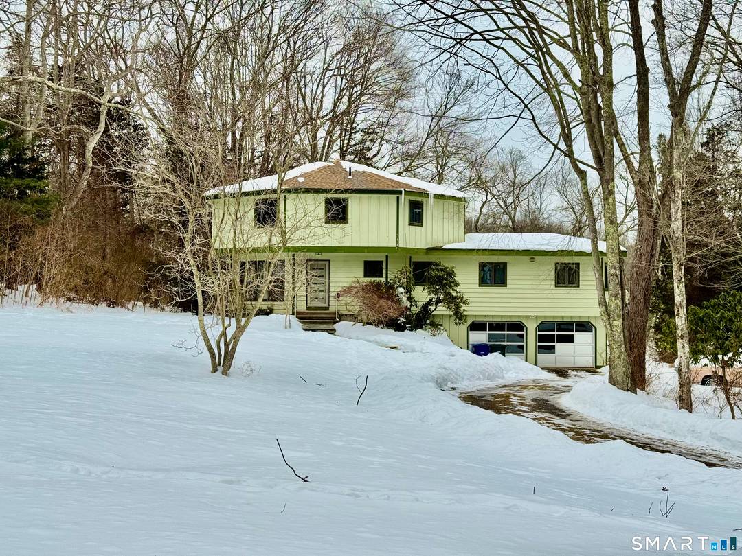 Quiet tranquil setting with tiered decks and slate patios to enjoy the sounds of nature.