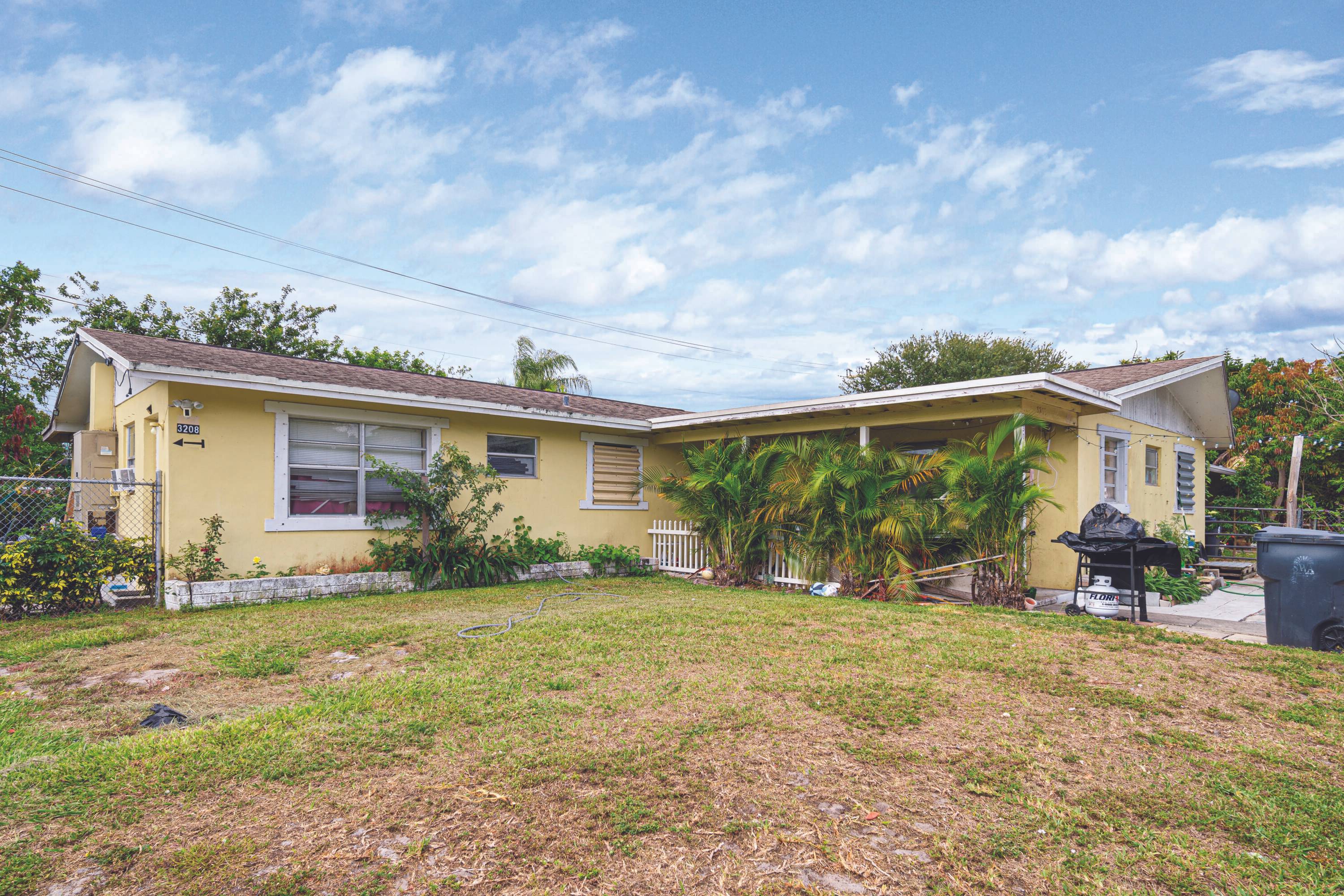 Duplex close to JFK Hospital, John Prince Park, and I 95 in unincorporated Palm Beach County.