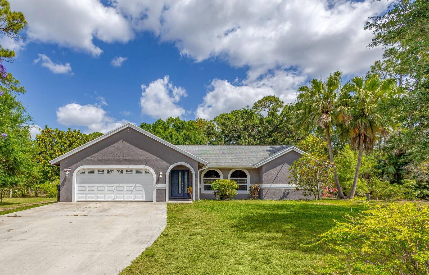 Welcome to this charming home located in the very sought out community ''The Acreage''.