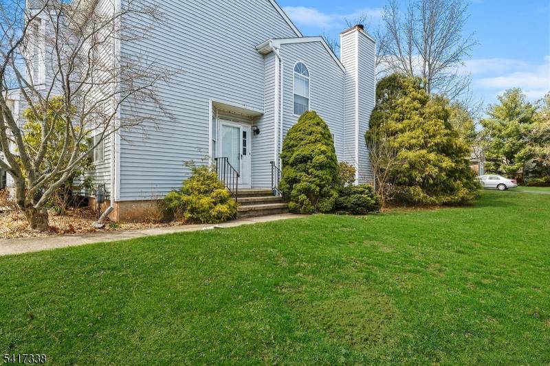 Welcome to 12 Buffalo Hollow Rd, a bright and spacious end unit townhome in Branchburg's desirable Chambers Brook community.