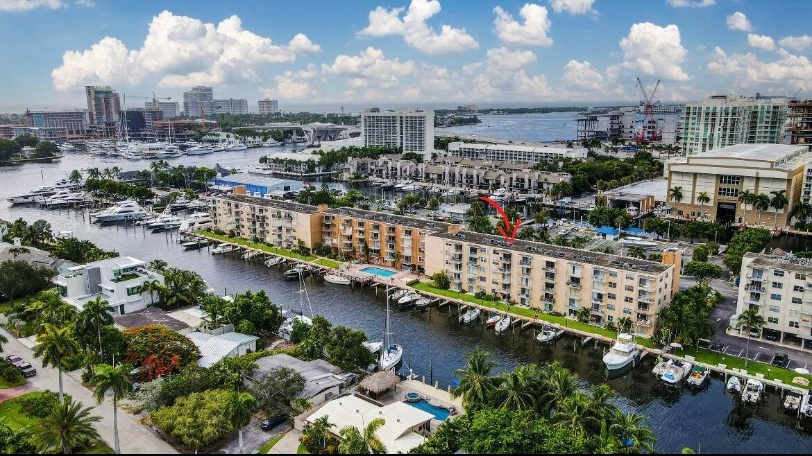 UNBELIEVABLE WATERFRONT OPPORTUNITY CONDO PRICED BELOW MARKET VALUE WITH EXCLUSIVE RARE RIGHTS TO DOUBLE BOAT SLIP !