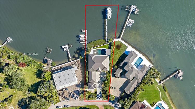 Waterfront estate home built in 2022, ideally positioned on a quiet street with fewer than ten homes and offering some of the most impressive views Jupiter has to offer.