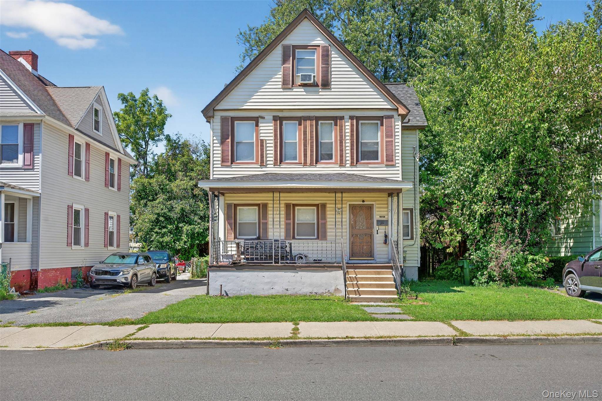 Discover this spacious two story home featuring hardwood floors and large rooms that provide ample living space.