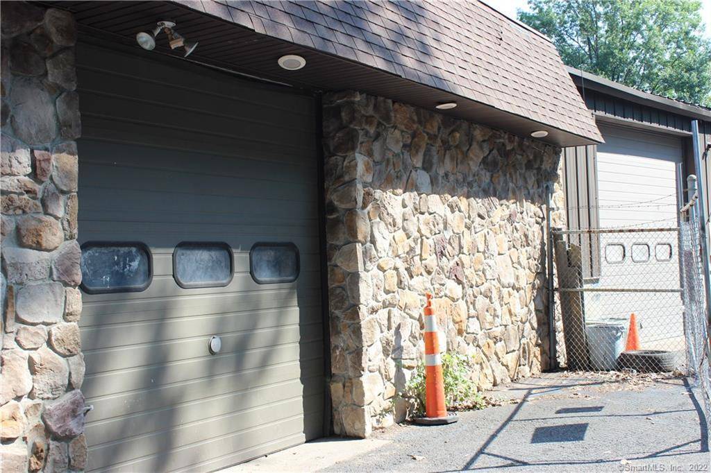 Great Opportunity for Investors or Owner Occupants with Car Business Included in a High Traffic Area !