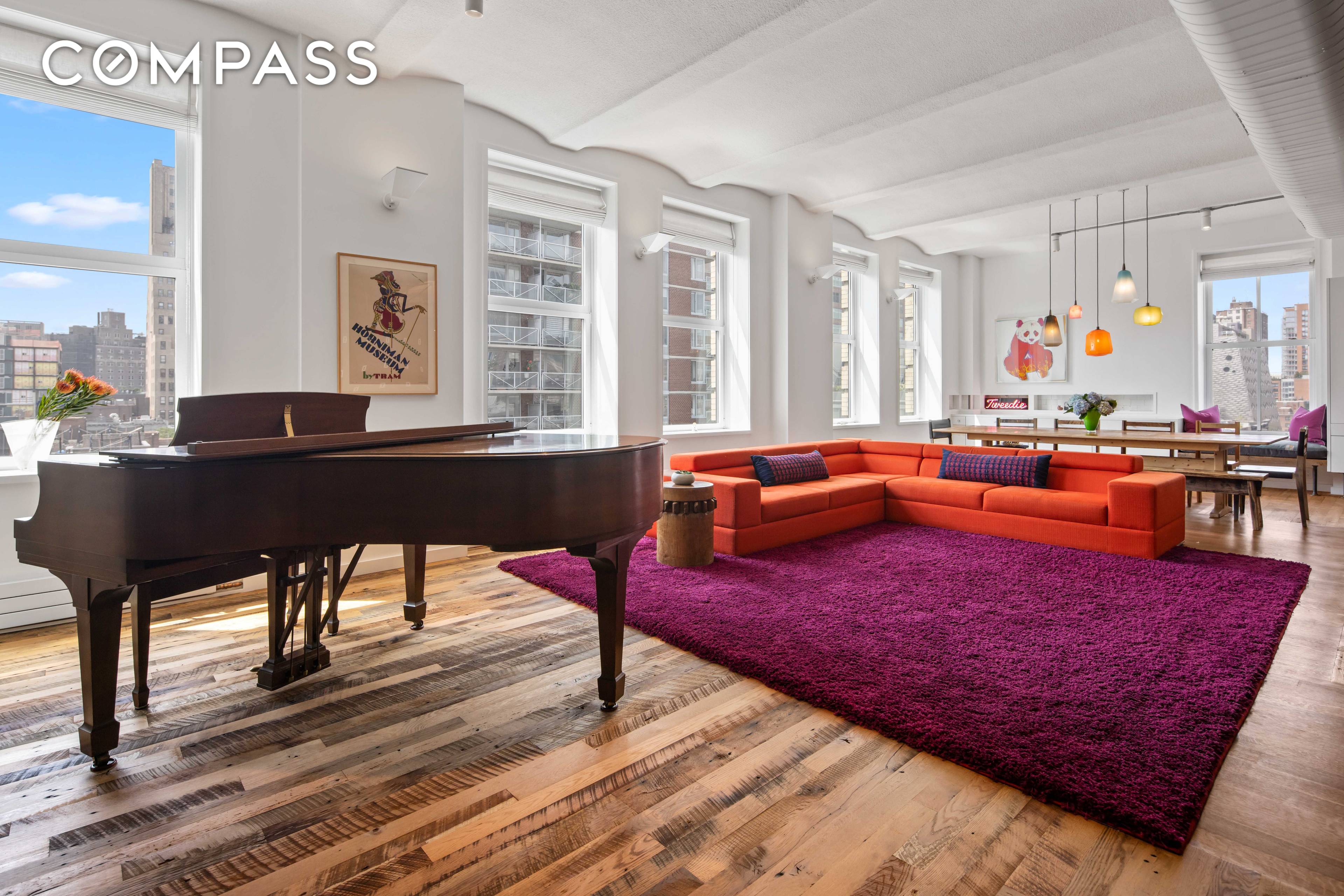 A sophisticated balance of industrial chic and colors encapsulate this powerfully unique residence.