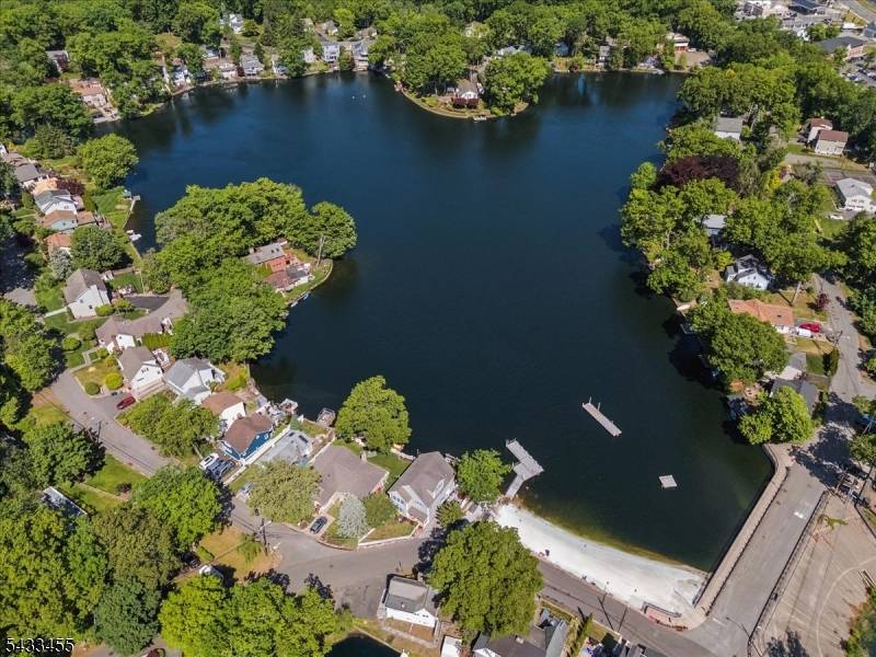 Experience lakefront living at its finest in sought after Rainbow Lakes.