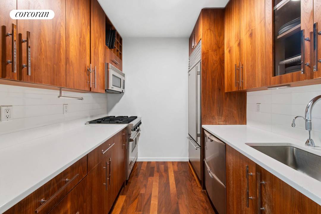 This sun drenched studio at 88 Greenwich Street offers sweeping, unobstructed views of New York Harbor and an ambiance that instantly feels elevated.