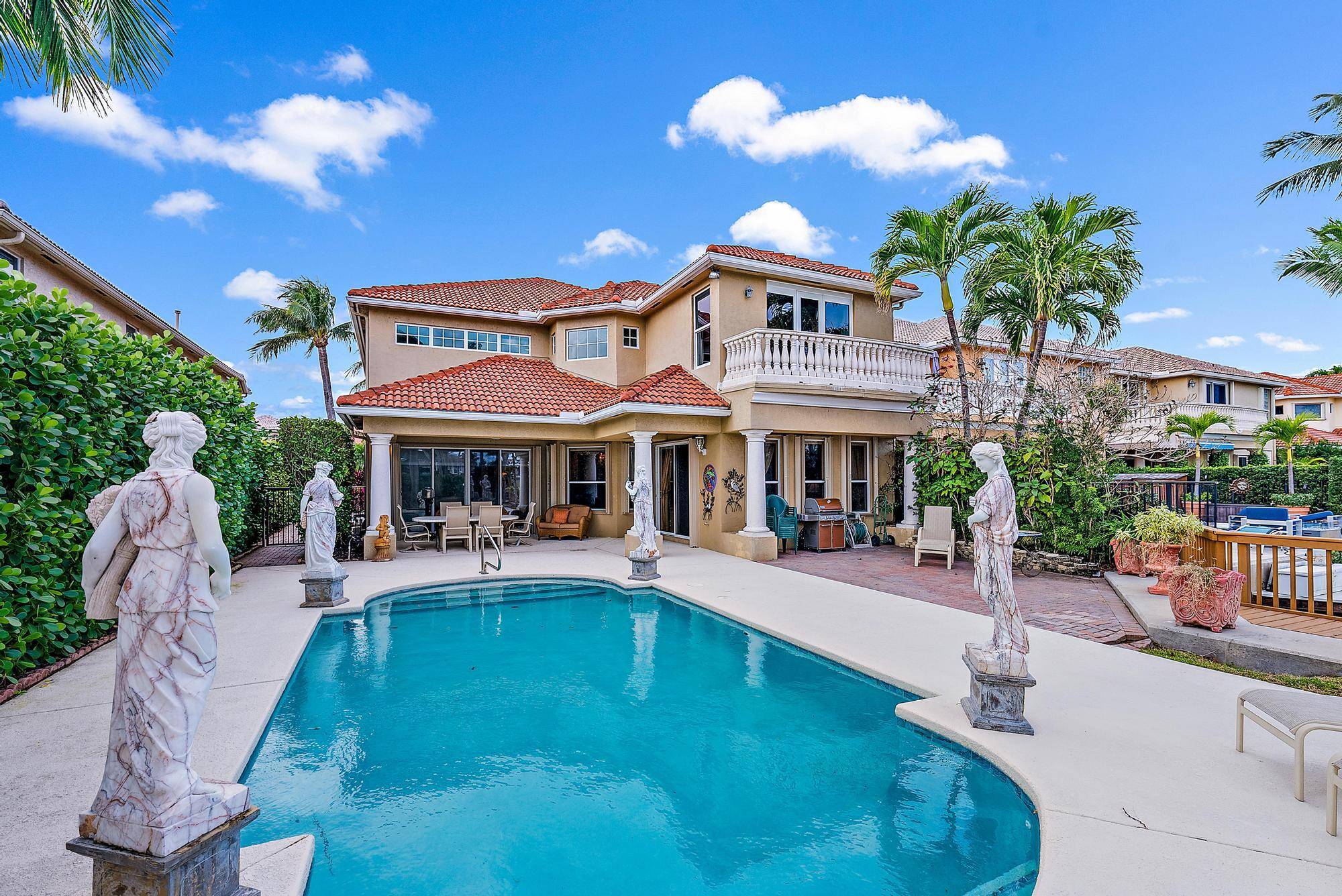 Beautiful Mediterranean style waterfront home with dock and 24, 000 lb lift.
