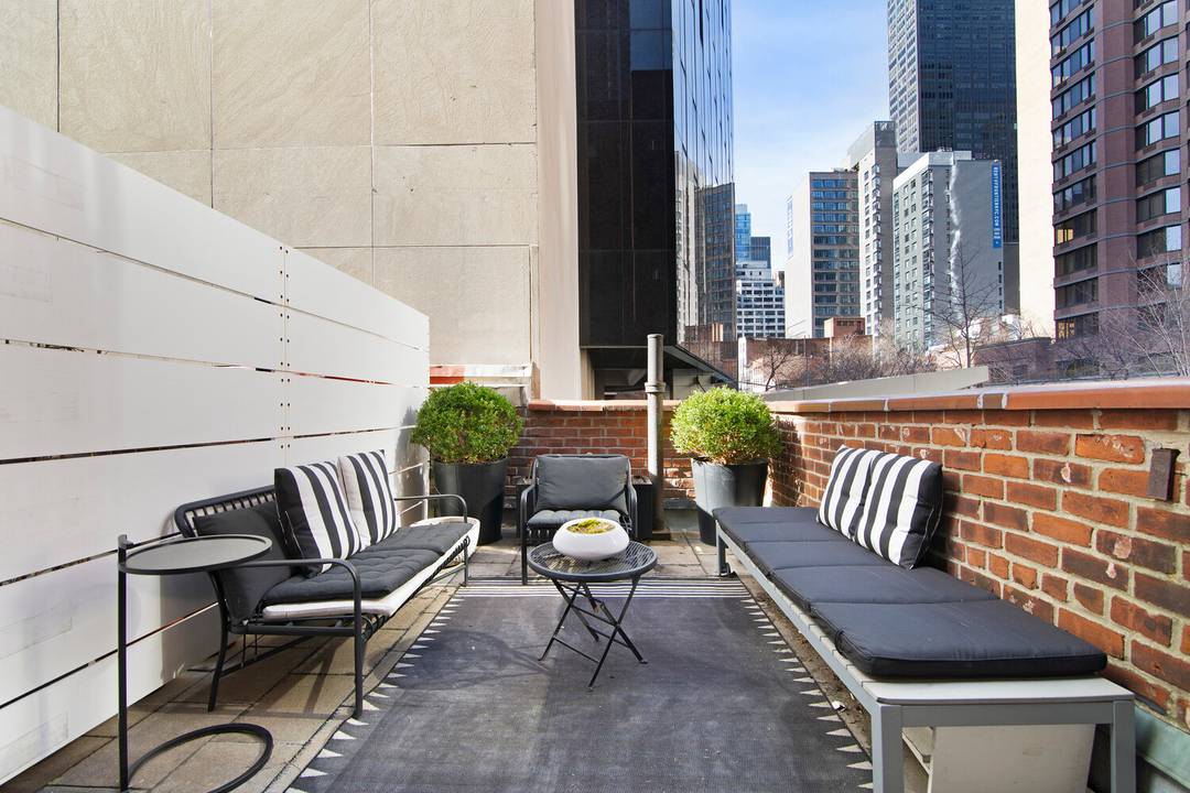 RARE TO MARKET ALCOVE STUDIO WITH CORNER TERRACE Coveted oversized alcove studio, one of only three apartments in the building with private outdoor space, enjoys sunny open exposures West and ...