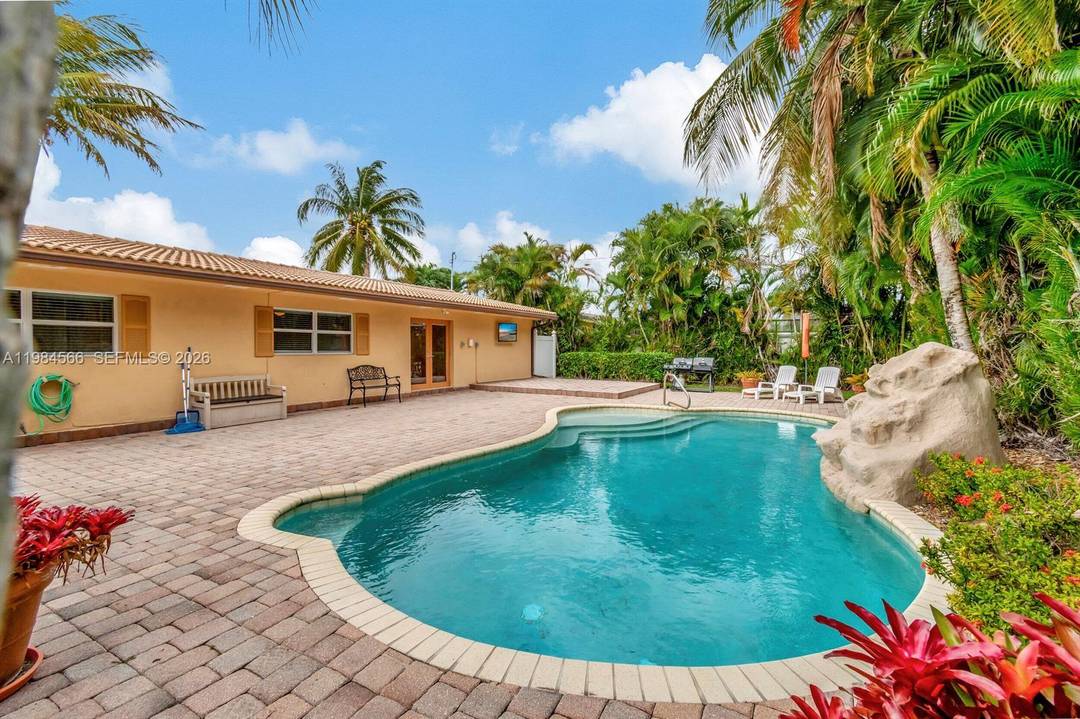 Stunning 4 bedroom, 2 bathroom single family home on a quiet tree lined street in the heart of Boca Raton with NO HOA !
