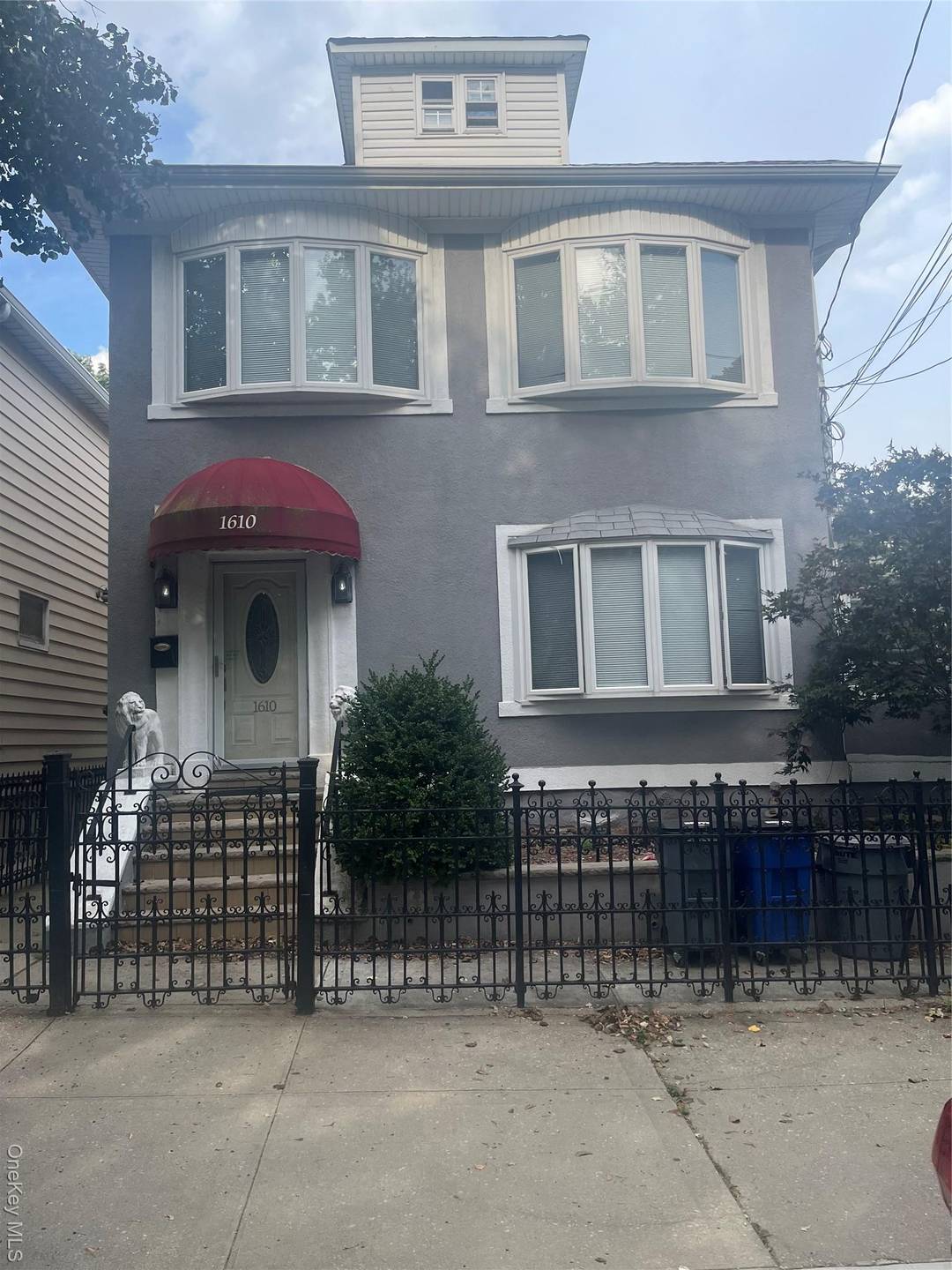 2 family, 3 bedroom over a 3 bedroom with a finished basement, backyard, and two car detached garage.