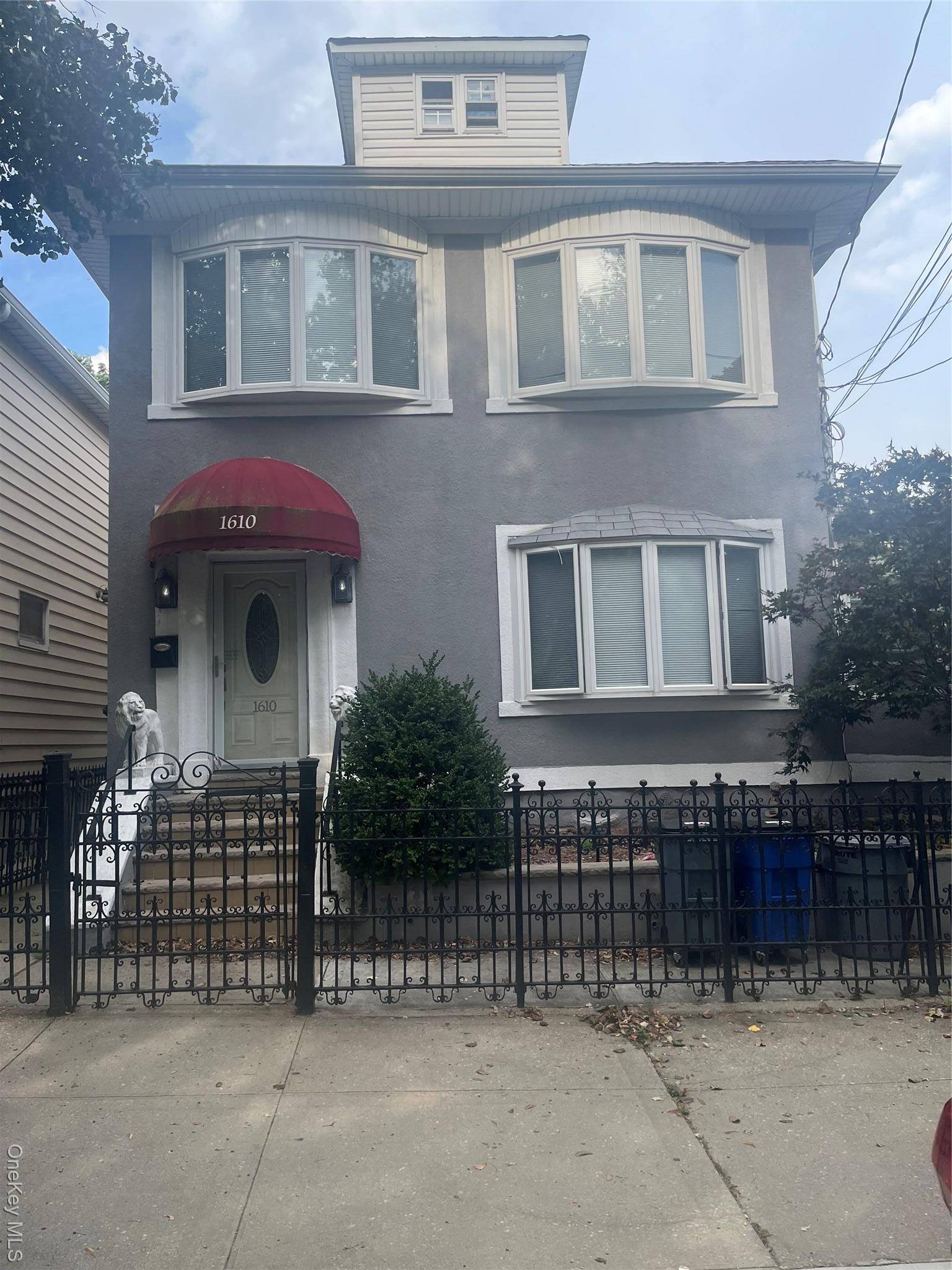 2 family, 3 bedroom over a 3 bedroom with a finished basement, backyard, and two car detached garage.