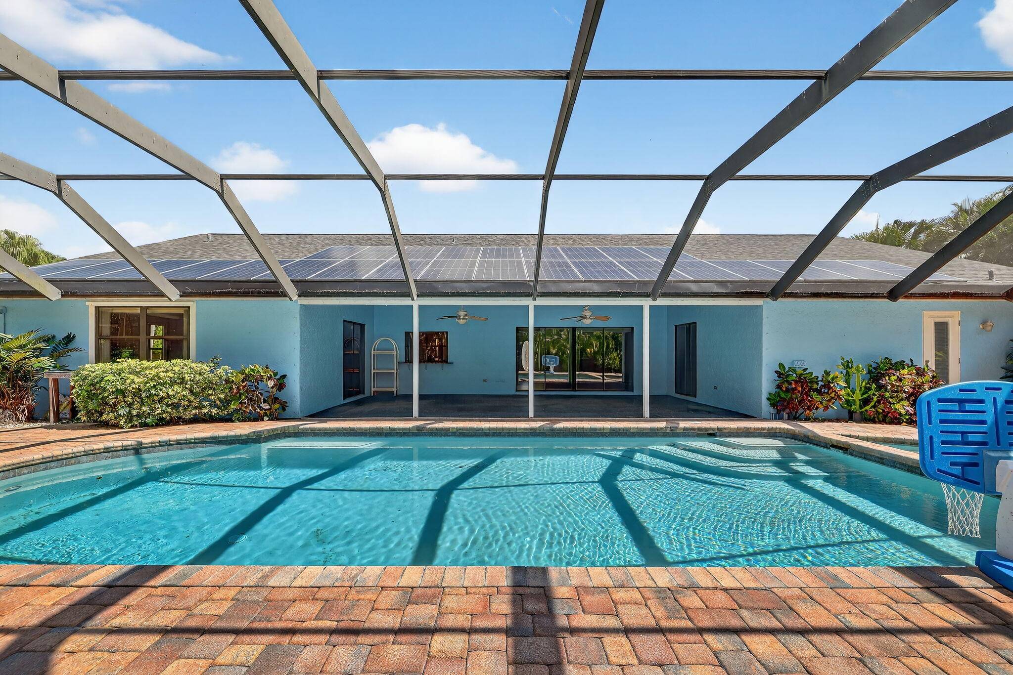 Stunning 4 bed, 3 bath pool home with 2 car garage on nearly half an acre in Hidden Oaks community.