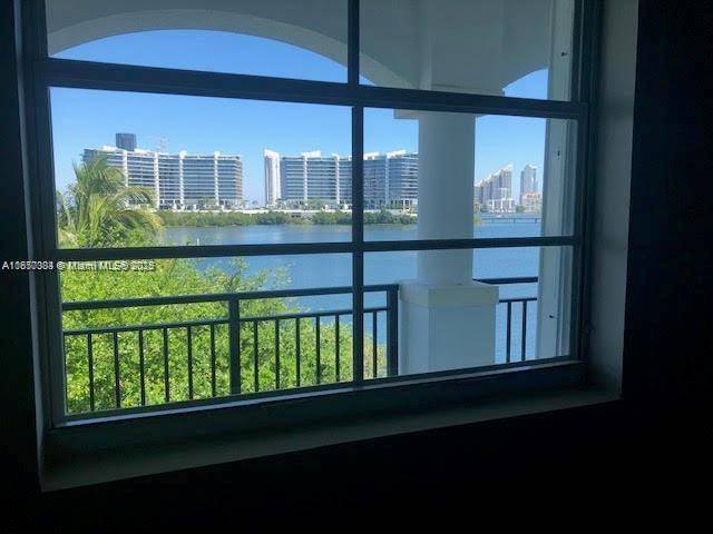 Amazing waterfront view in a Mediterranean style gated community with Resort Lifestyle in the heart of Aventura.