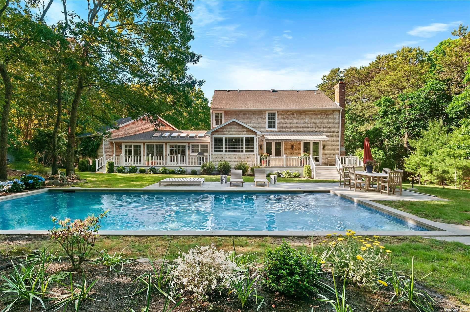 Welcome to 24 Marion Lane, a stunning residence offering the epitome of luxury living in East Hampton.