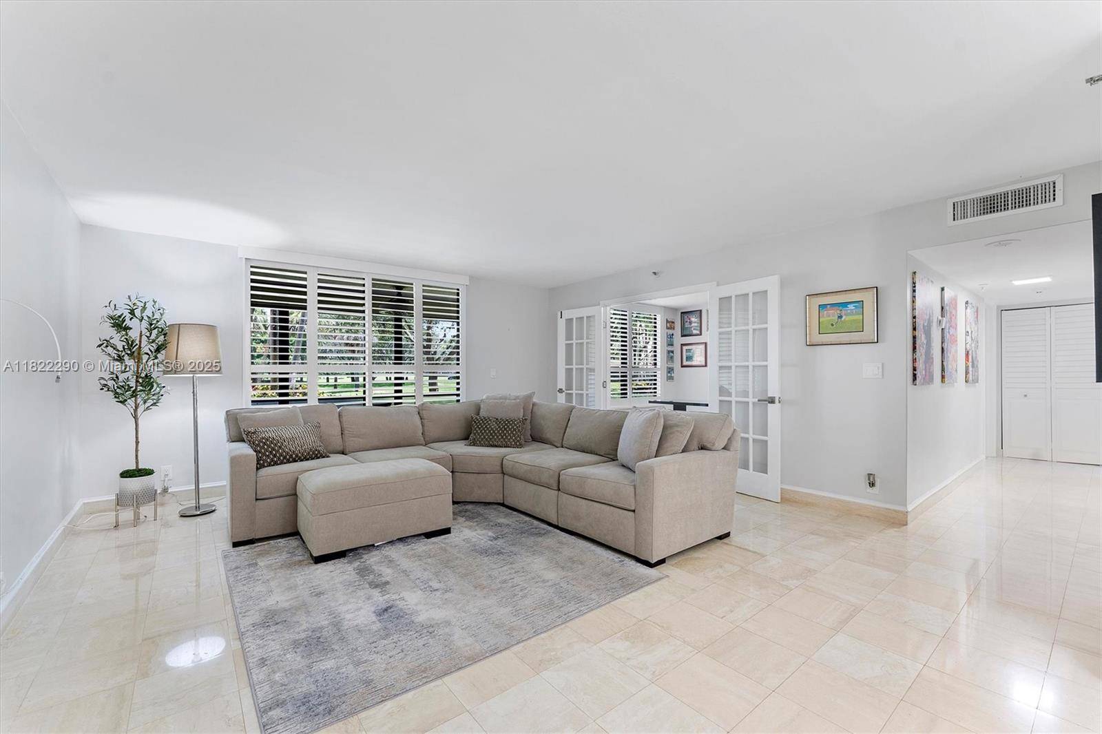 Updated condo in Boca Pointe offering natural light, comfort, and serene golf course views.