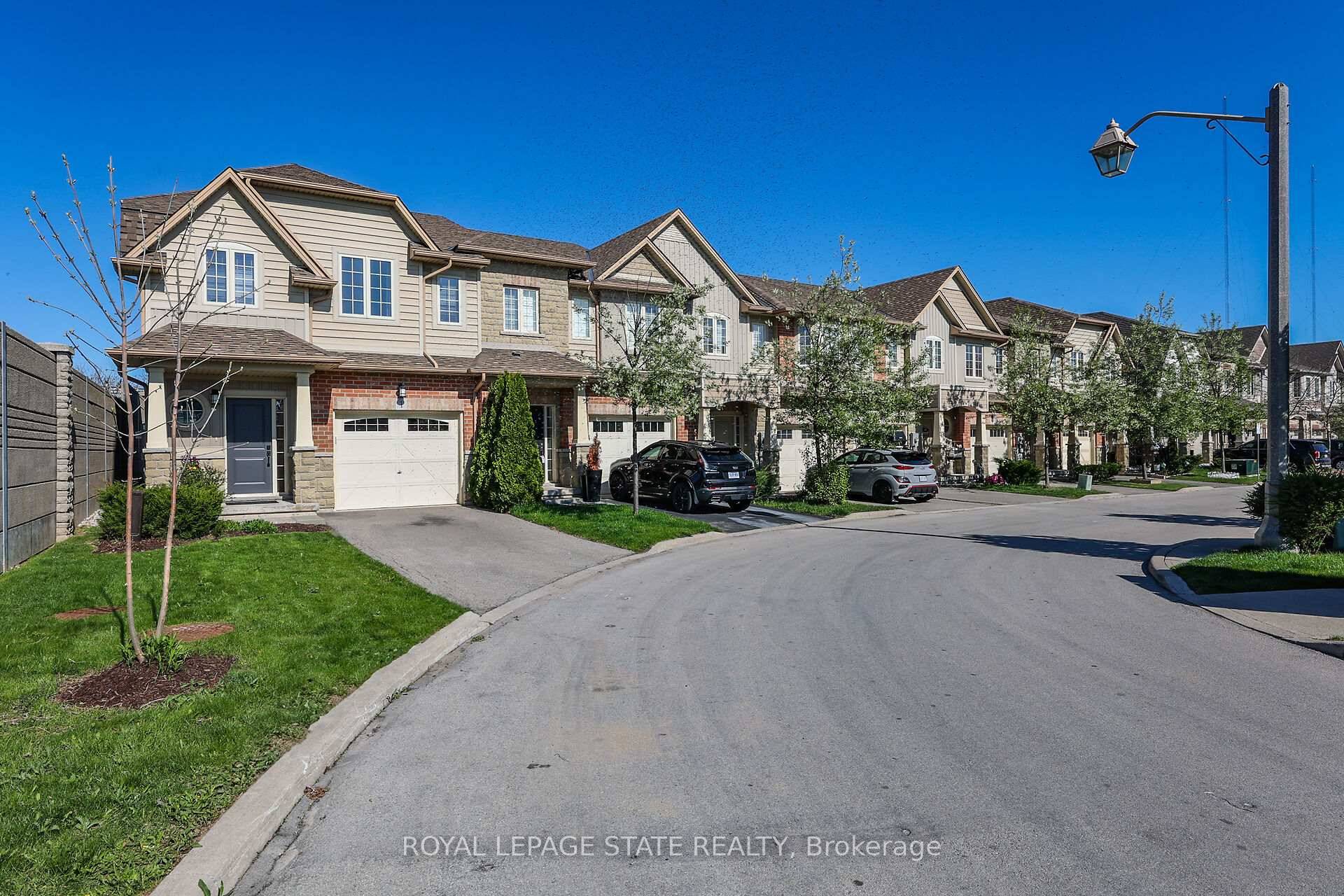 Bright, spacious and stylish end unit MARZ built townhome ideally located within walking distance to trendy Grimsby on the Lake amenities including walking paths, restaurants and shops.
