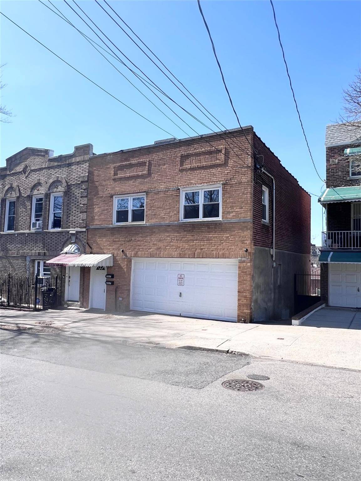 Fully Renovated Two Family Brick Home in Sought After Morris Park.