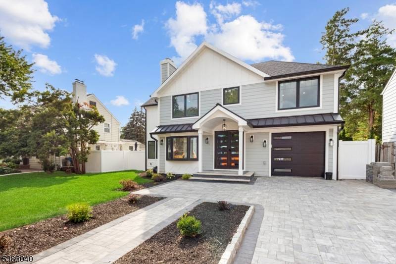 Welcome to 1287 Oxford Ln, a stunning, fully renovated Colonial style home that defines modern luxury.