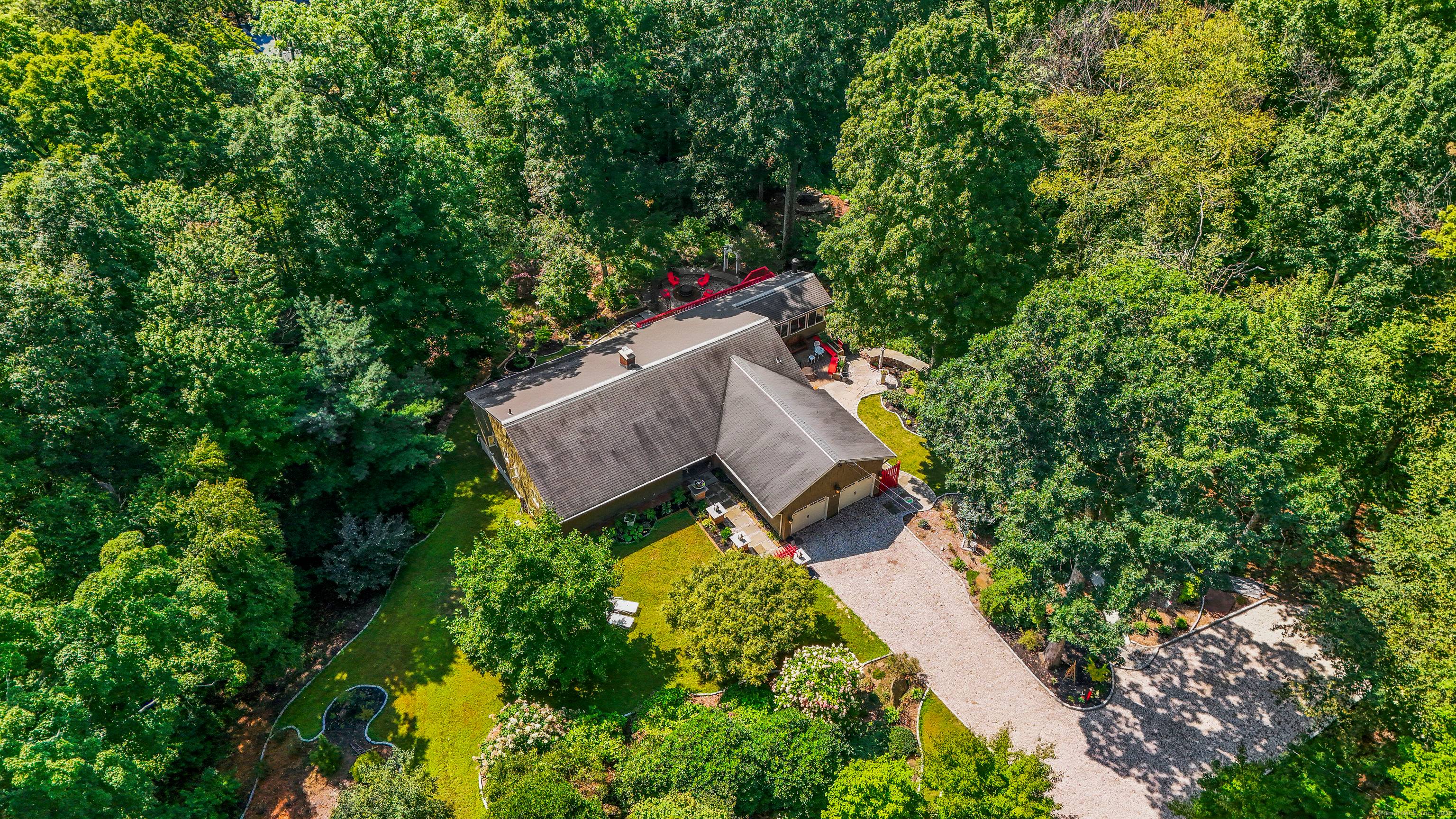 Welcome to this meticulously maintained Mid Century Ranch, nestled beside a 4 mile reservoir trail with stunning wooded views.