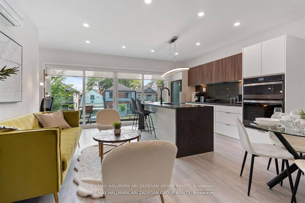 This Beautiful Brand New Three Bedroom Executive Furnished Second Floor Suite Of A Legal Triplex Has Been Designed To The Highest Standard And Is Located In The Desirable Leslieville Neighbourhood.