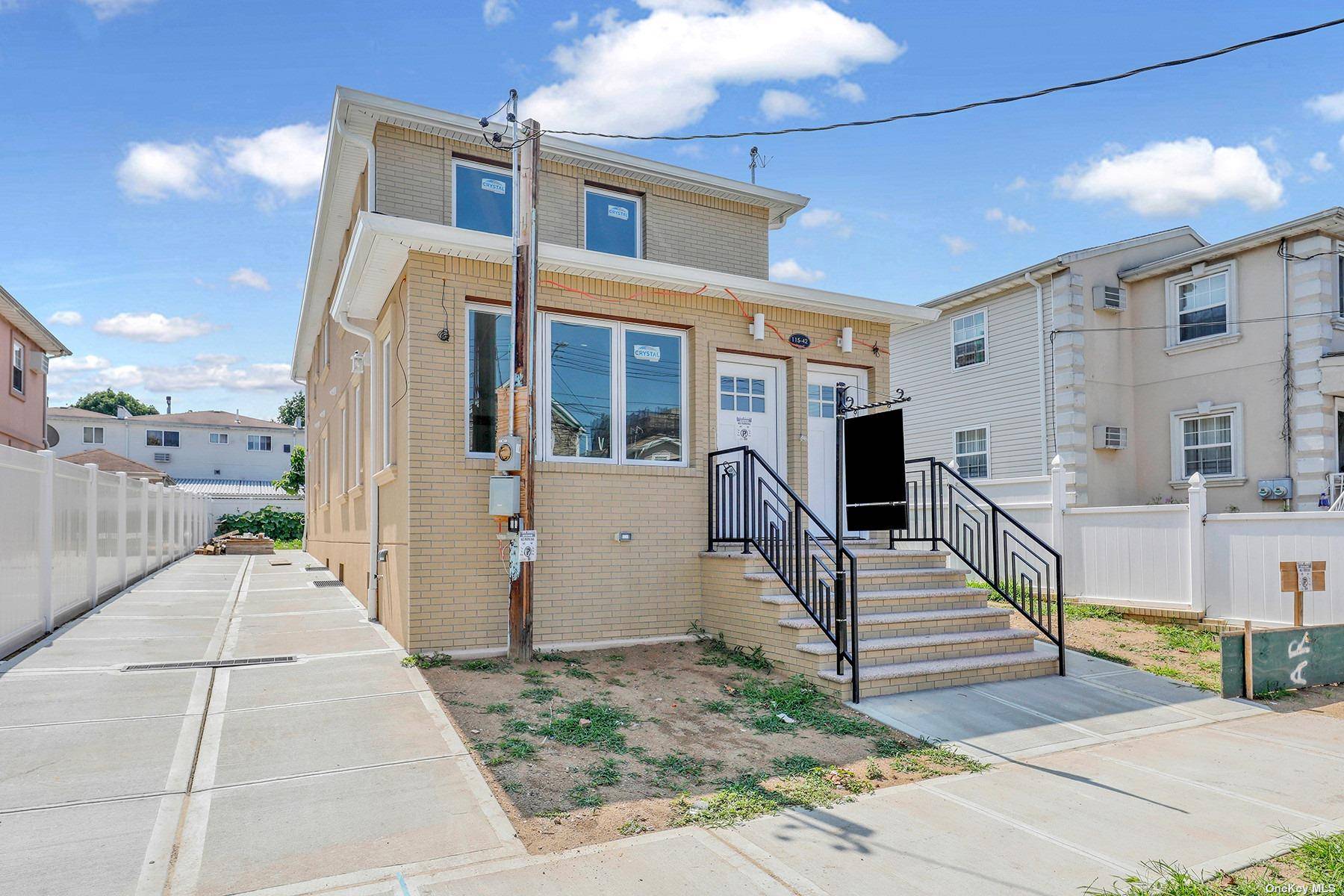 New Constructed custom built two family nestled on a beautiful tree lined street of highly sought after South Ozone Park.
