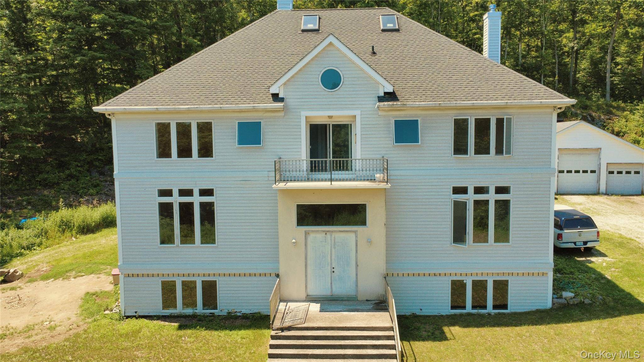 Prime 98 Acre Estate with impressive views, situated on a corner lot that maximizes both seclusion and privacy.