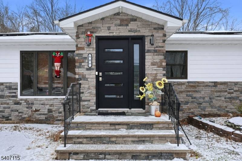 Stunning two family home in Old Bridge, NJ, offering a rare opportunity with updated roof, siding, and paver curb appeal.