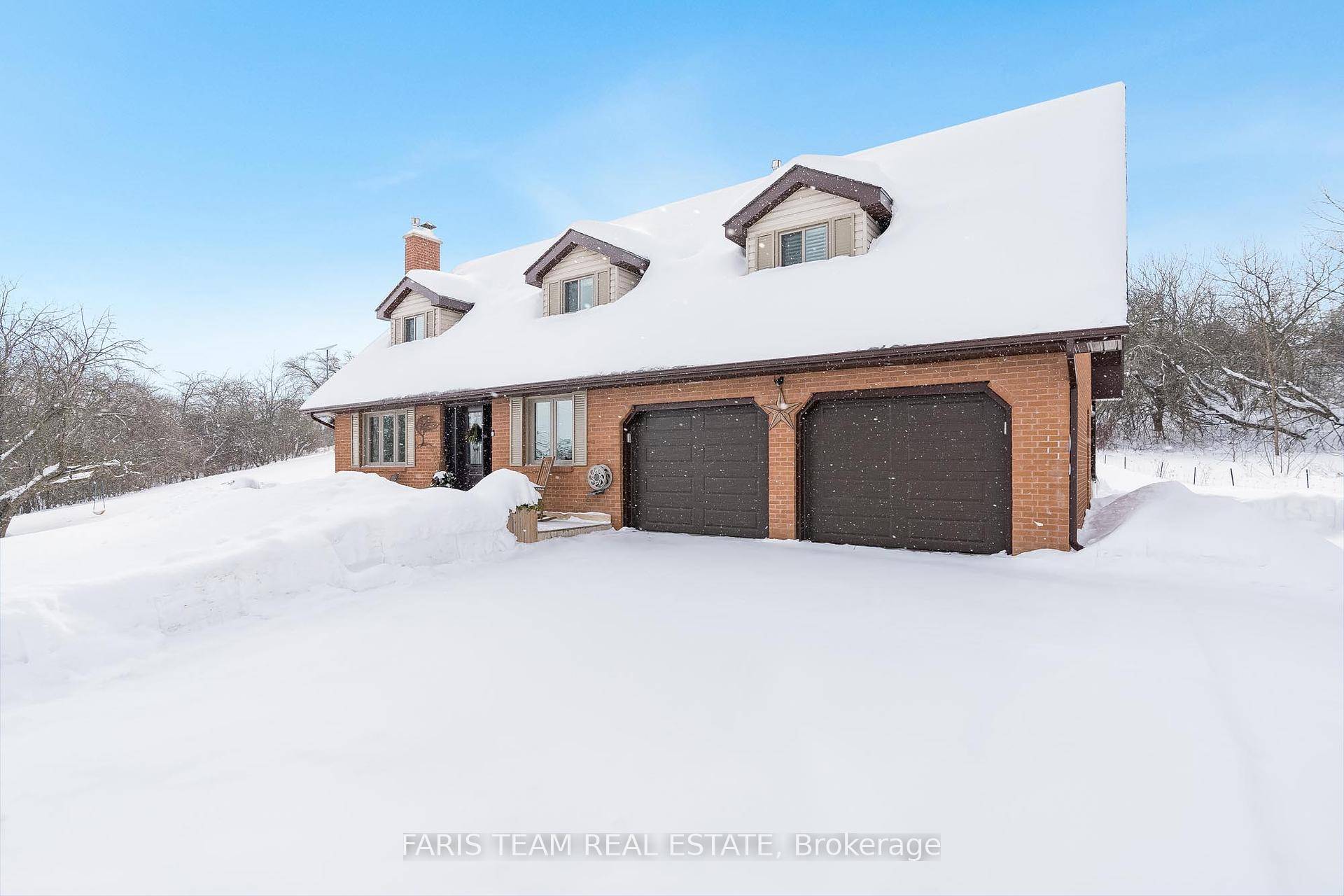 Top 5 Reasons You Will Love This Home 1 Follow the charming circular driveway to discover this secluded three bedroom home, offering a serene retreat surrounded by nature's beauty, settled ...