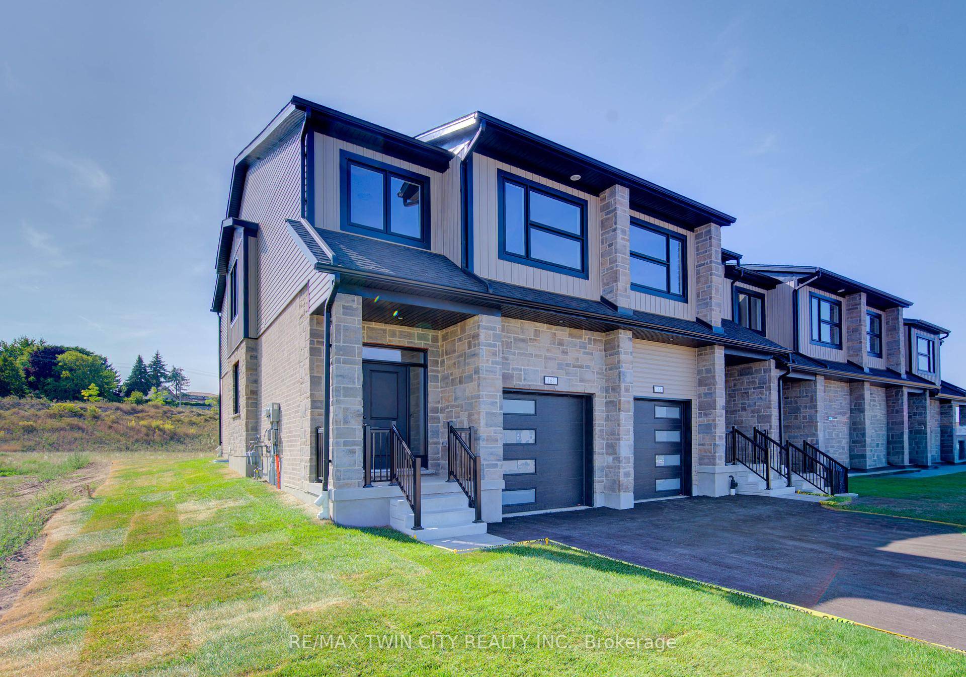 Welcome to this stunning, brand new end unit townhome, featuring a beautiful stone exterior and a host of modern finishes youve been searching for.