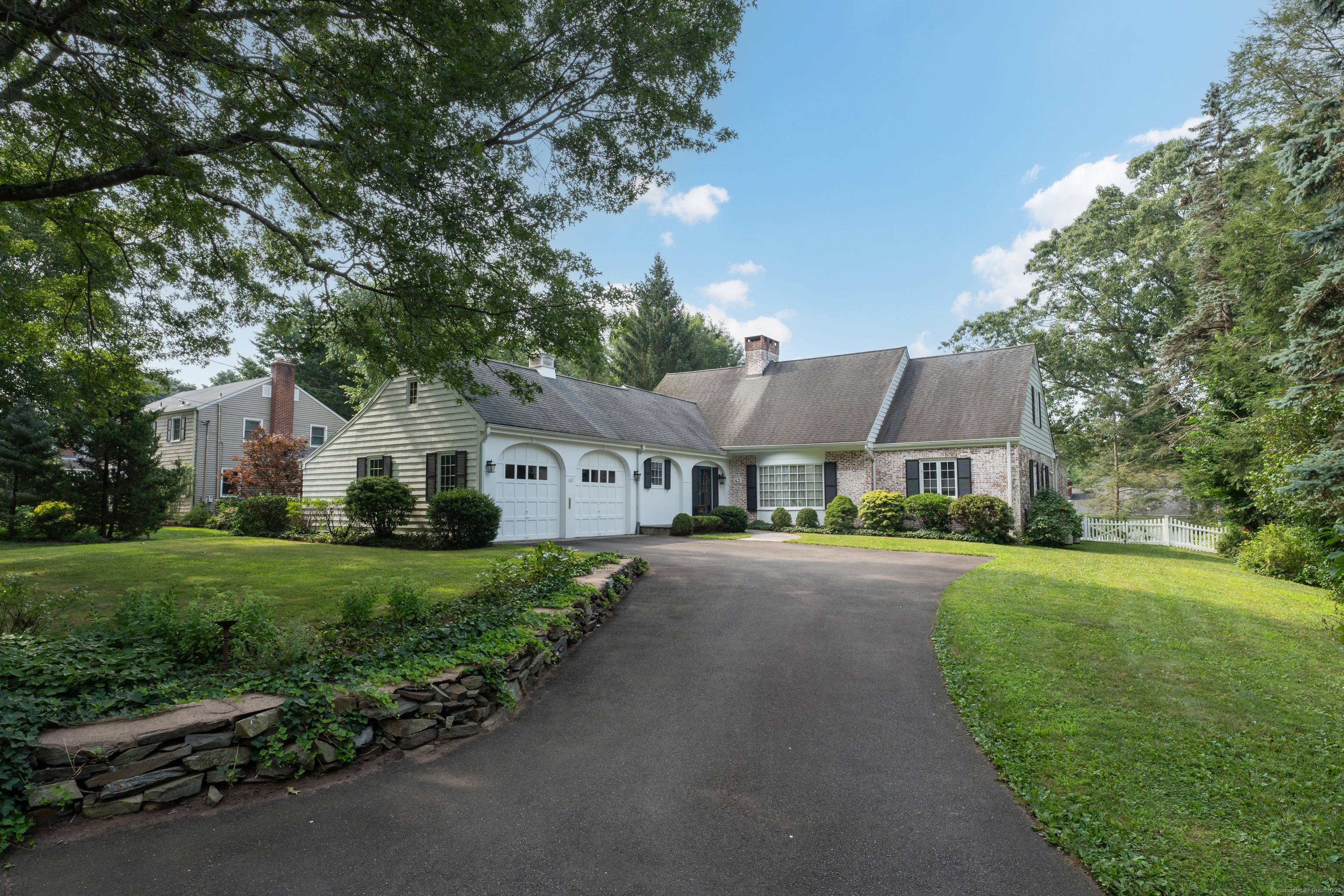 Welcome to this charming Cape Cod with a custom ranch style addition !
