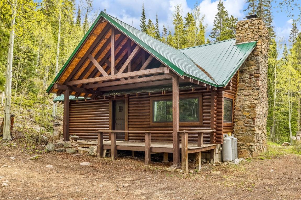 Disappear into the trees in this alpine log cabin located at the base of Herman Gulch.