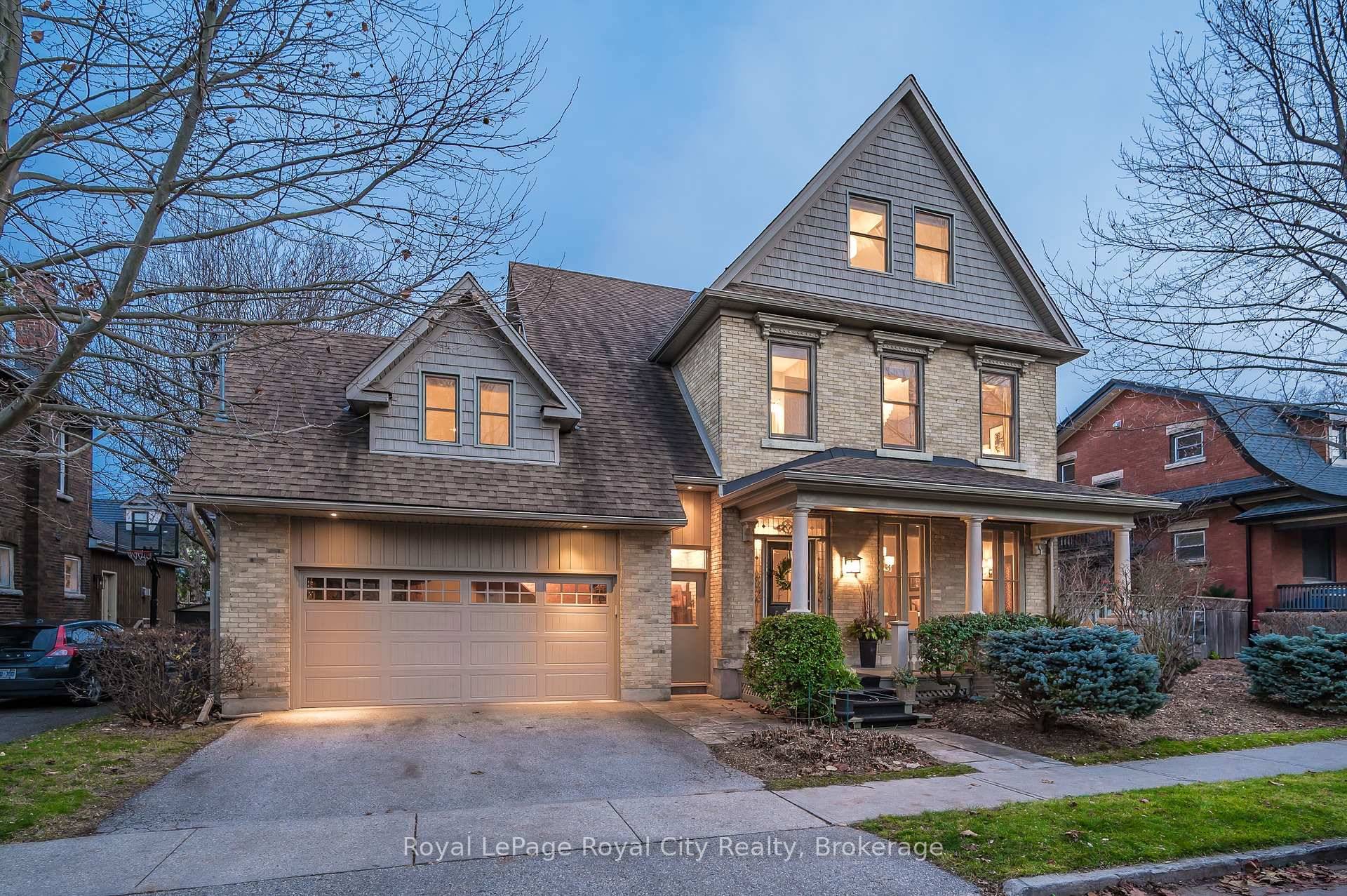 Discover timeless charm in this exquisite century home, perfectly situated on a tranquil street just steps from downtown.