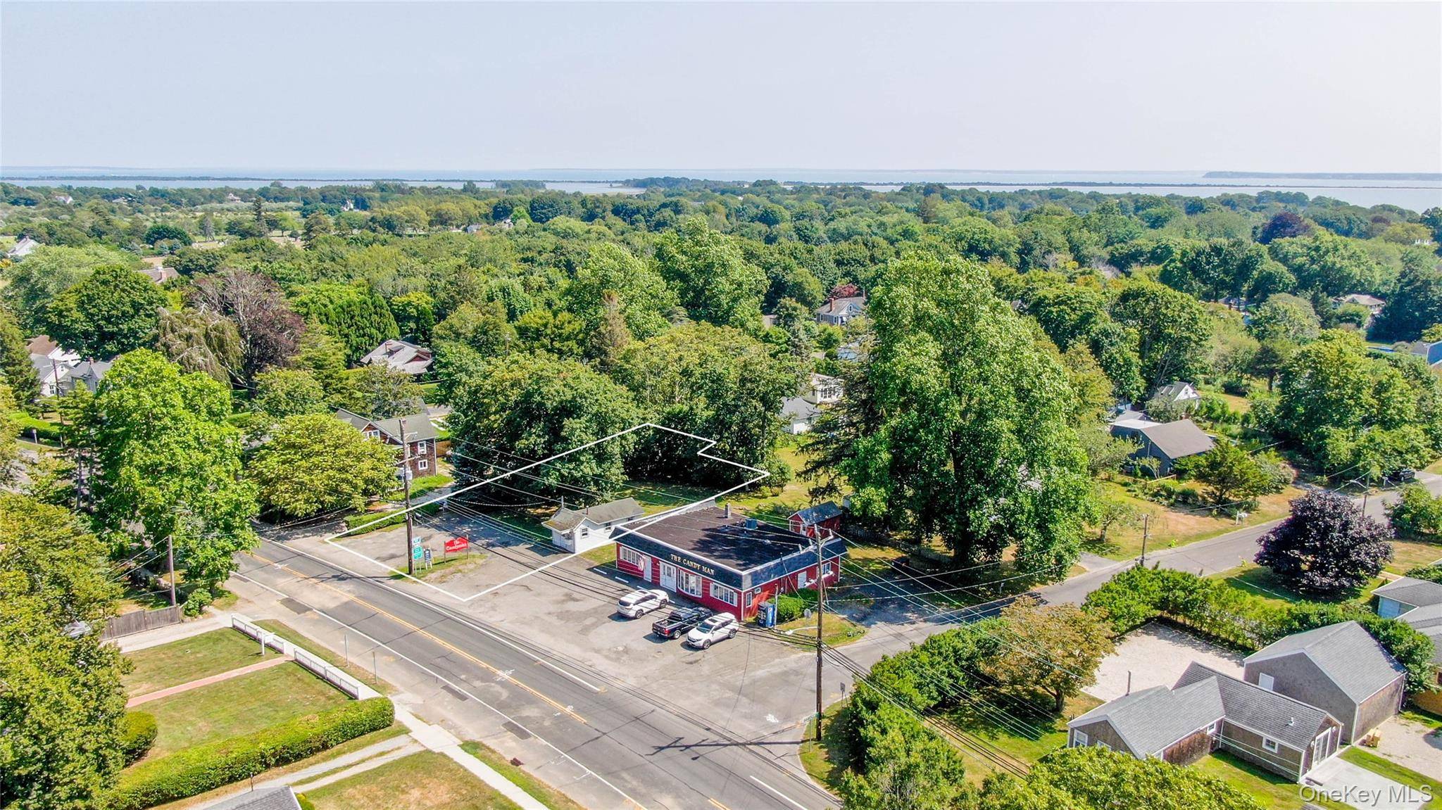 Set on just under a quarter acre, this unique property is zoned General Business, providing one of the most versatile ownership opportunities in the area permitting both commercial and residential ...