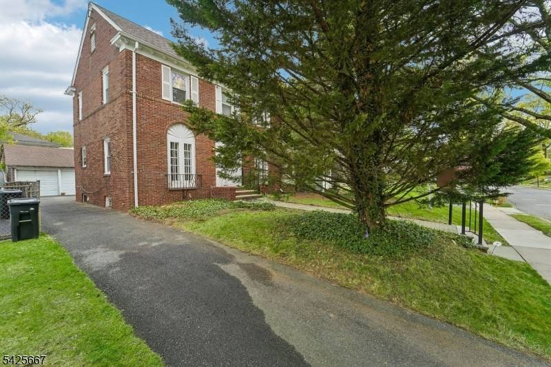 Classic charm and timeless character define this stately center hall brick Colonial, beautifully positioned on a picturesque tree lined street in South Orange, just moments from Seton Hall University.