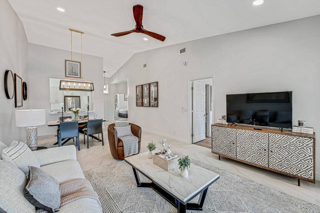 Escape to the South Florida lifestyle in this beautifully furnished 2 bedroom seasonal residence with serene water views, ideally located in Palm Beach Gardens.