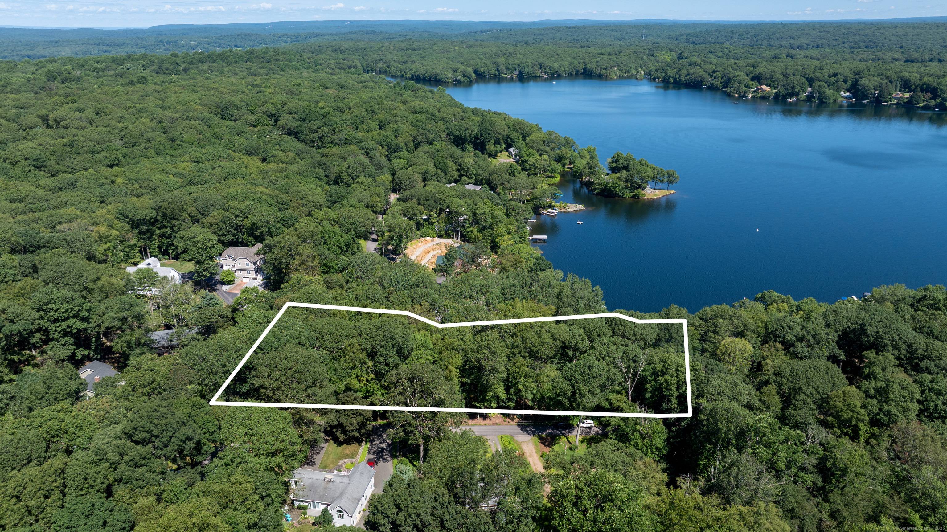 BASHAN LAKE WATERFRONT ! Highly touted, beautiful and build ready, this one acre is an approved lot for a 4BR home directly fronting on Bashan Lake.