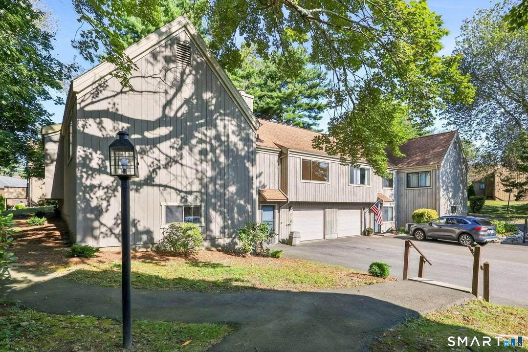 Welcome to effortless Oronoque Village living in this beautifully remodeled Wolcott style end unit, tucked away on a quiet cul de sac within the coveted North Trail complex.