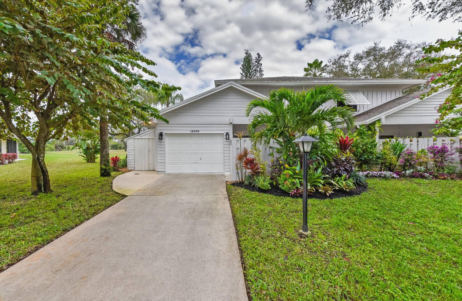 This 3BR 3BA luxurious townhome situated in the sought after Eaglewood Golf Community with spectacular views overlooking the 8th fairway has all the upgrades and improvements imaginable !