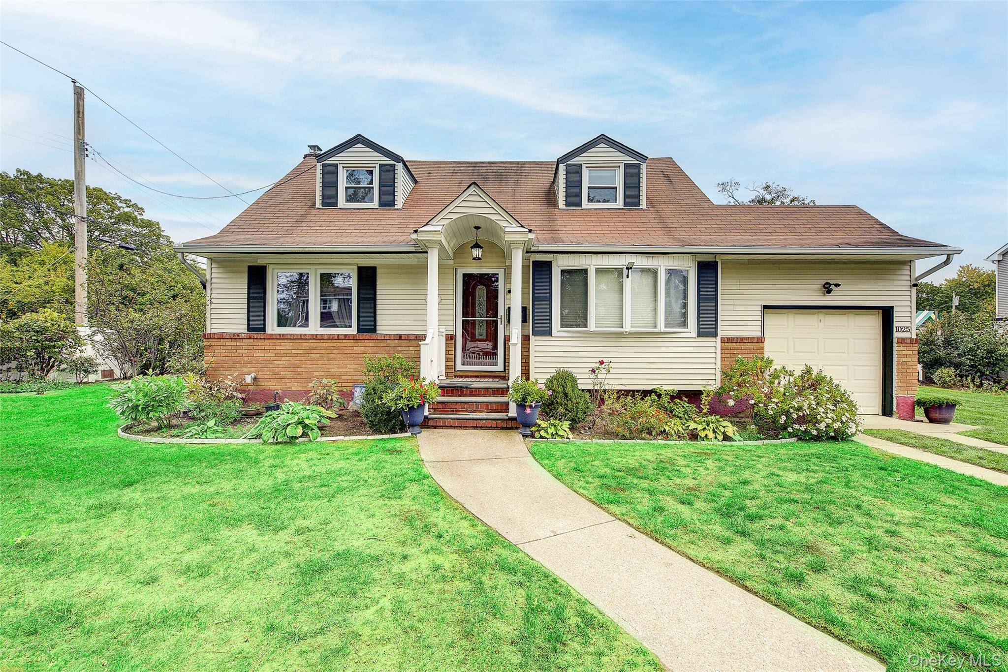 Welcome to 1025 Ontario Road, West Hempstead, NY 11552 a beautifully maintained home offering comfort, style, and convenience.